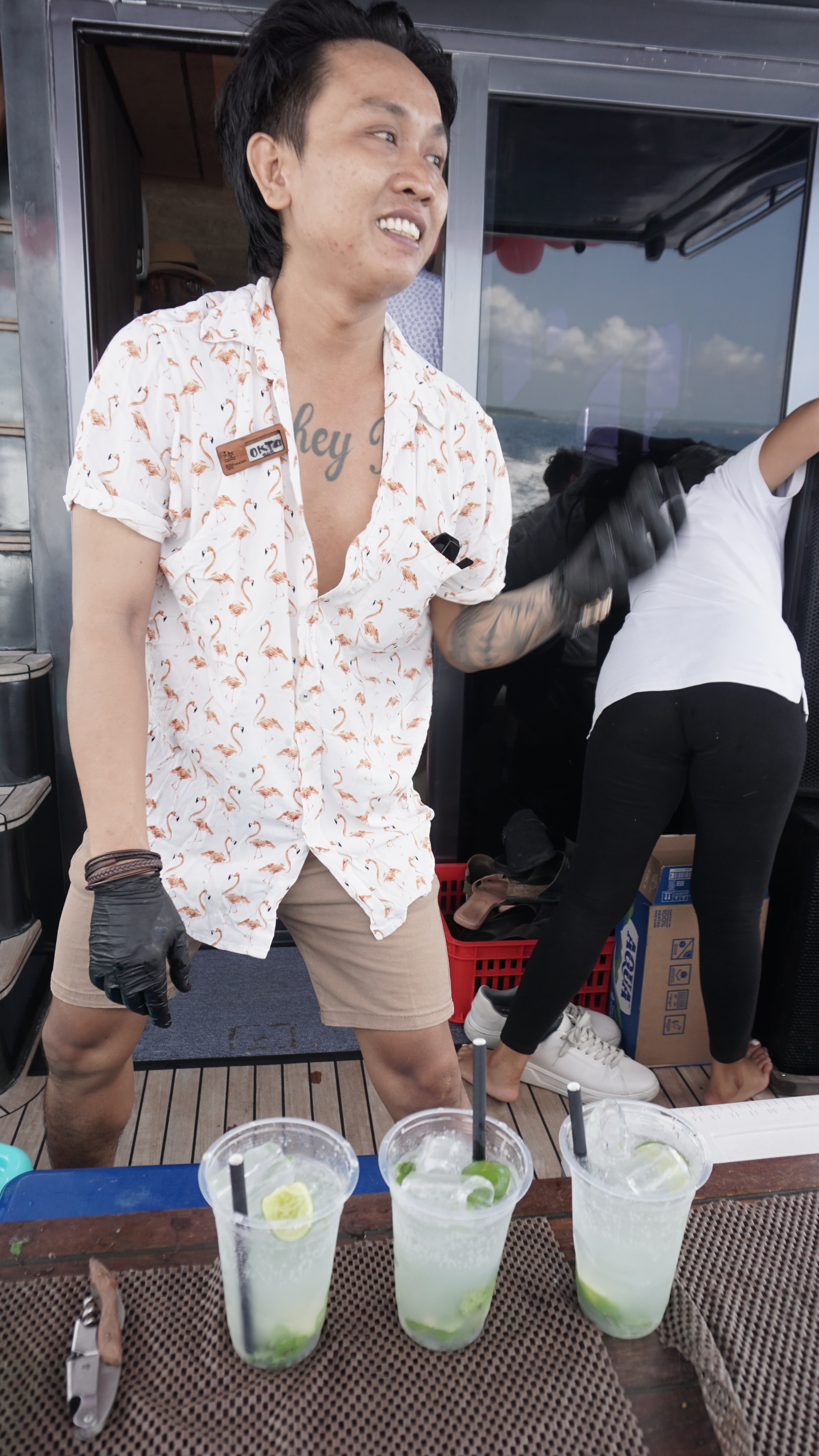 Bartender serving cocktails on the boat