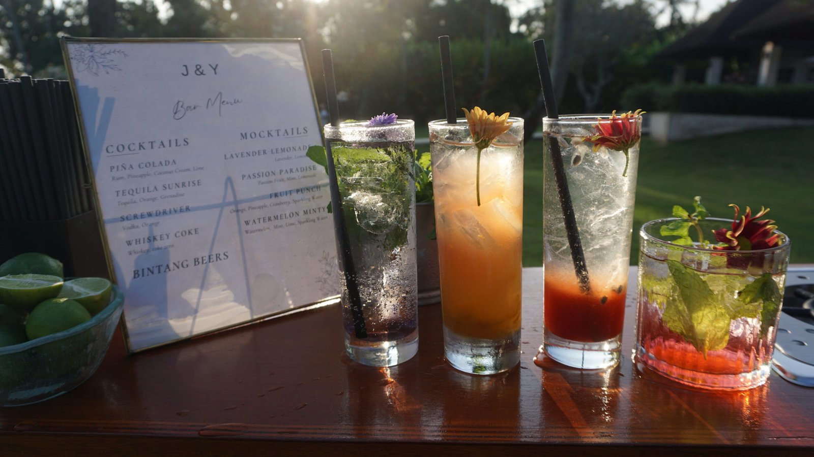 Cocktail menu and drinks lineup at a sunset villa party in Bali